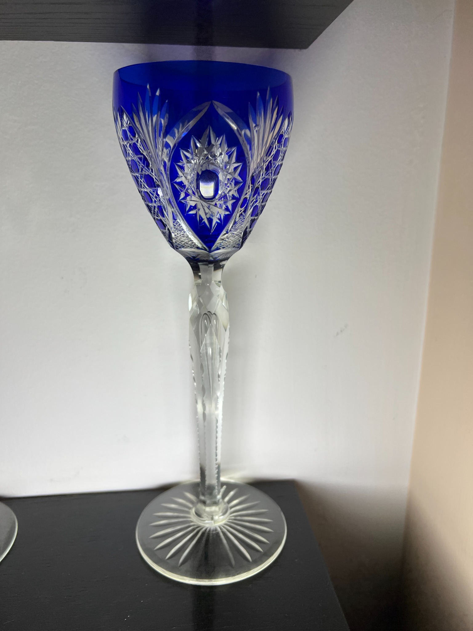 Cut crystal wine goblet with cobalt blue overlay