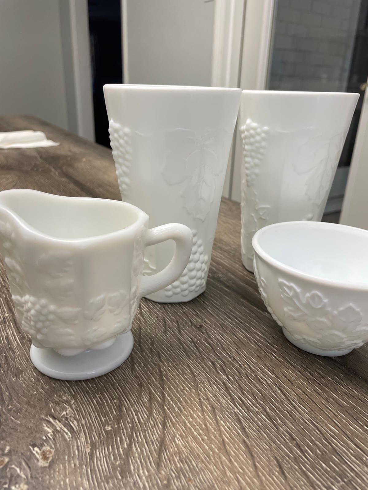 White milk glass tableware set with grape and vine relief