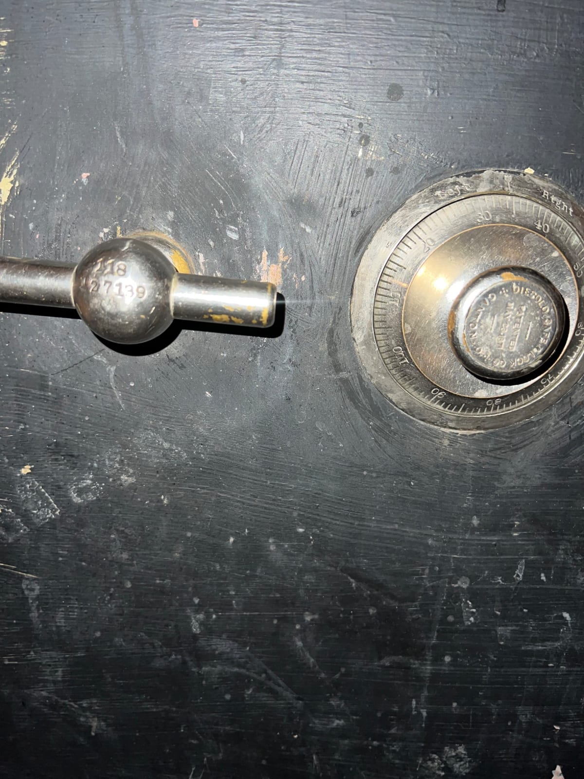 Combination safe lock mechanism (likely on a vintage fireproof safe or strongbox)