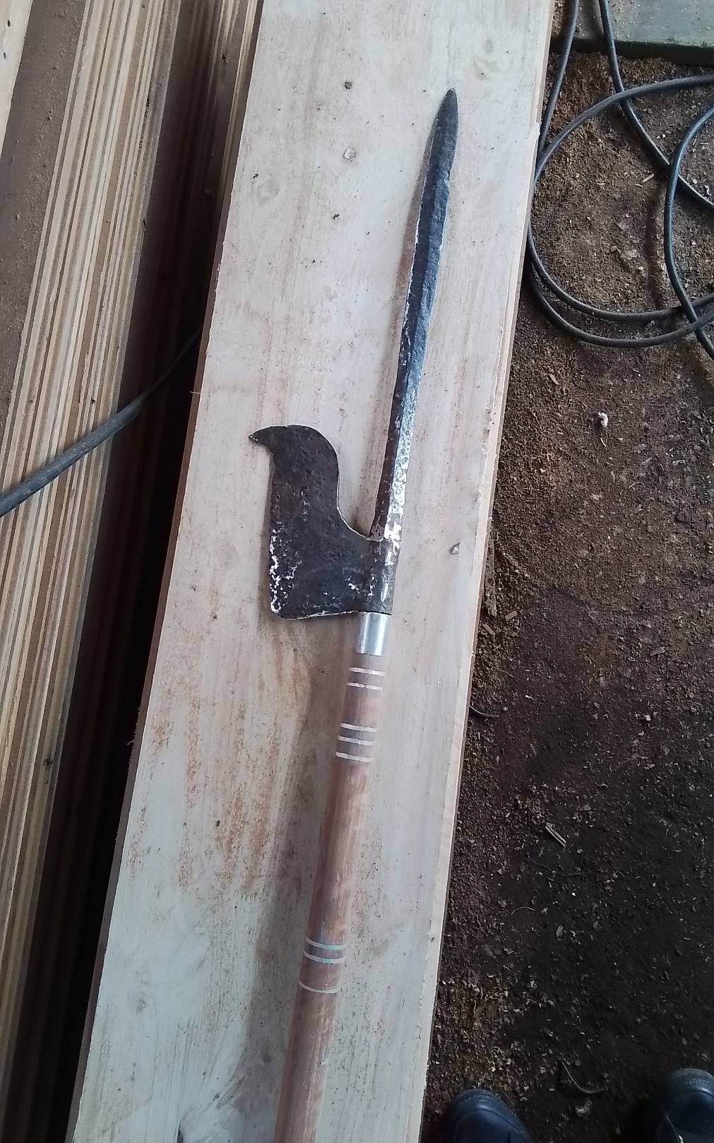 Hand-forged agricultural blade/hoe-like tool on wooden handle