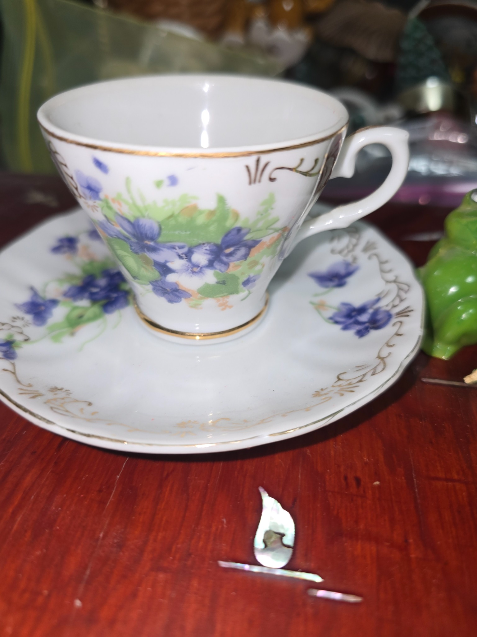 Floral porcelain teacup and saucer
