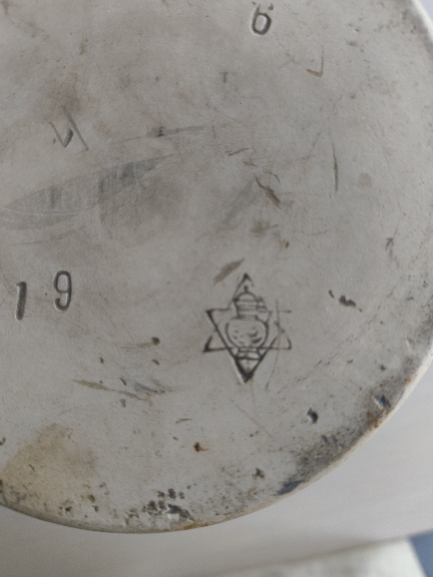 Ceramic or porcelain vessel base with printed maker's mark