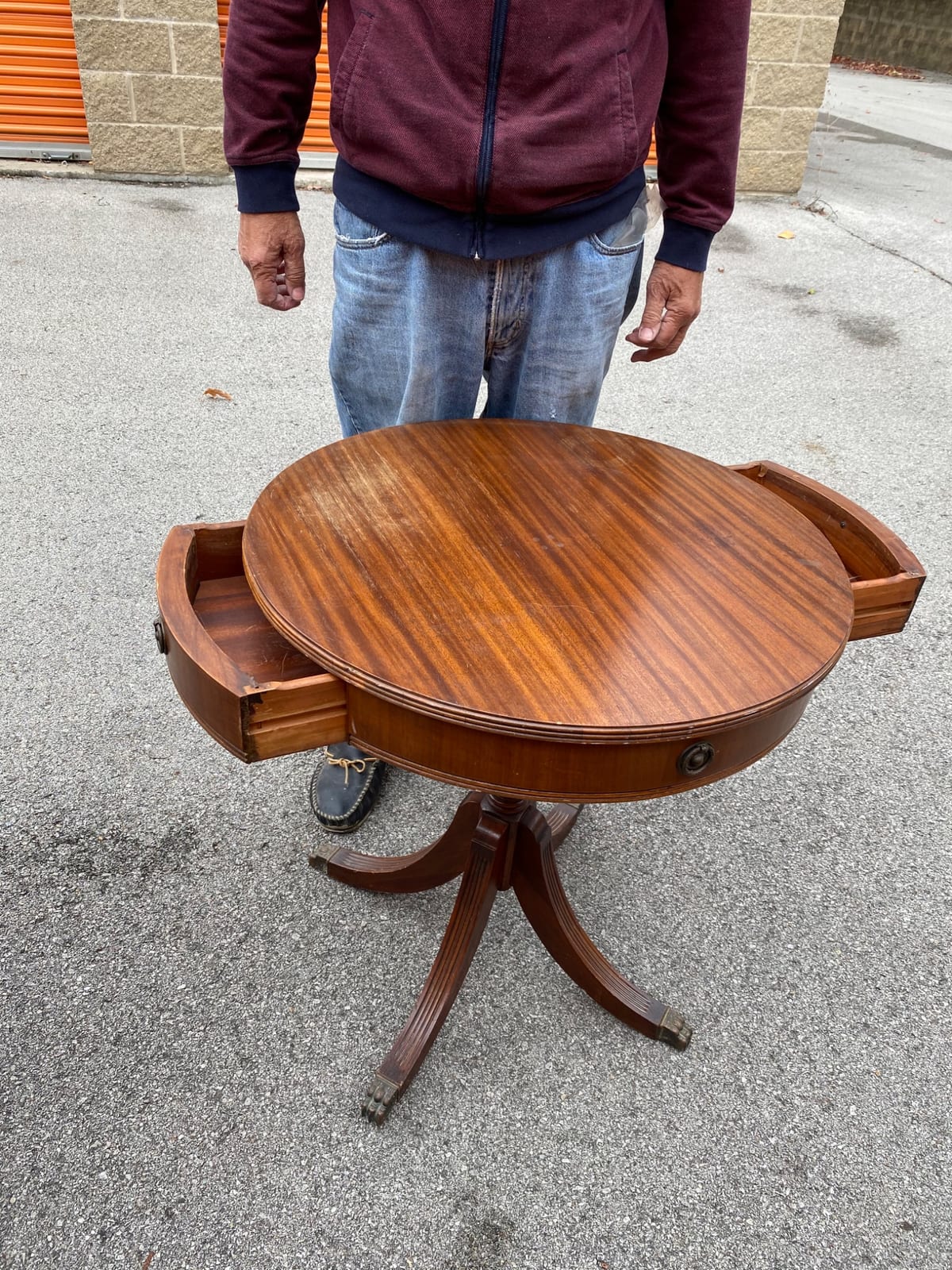 Round mahogany drop-leaf or tambour side table with pedestal base