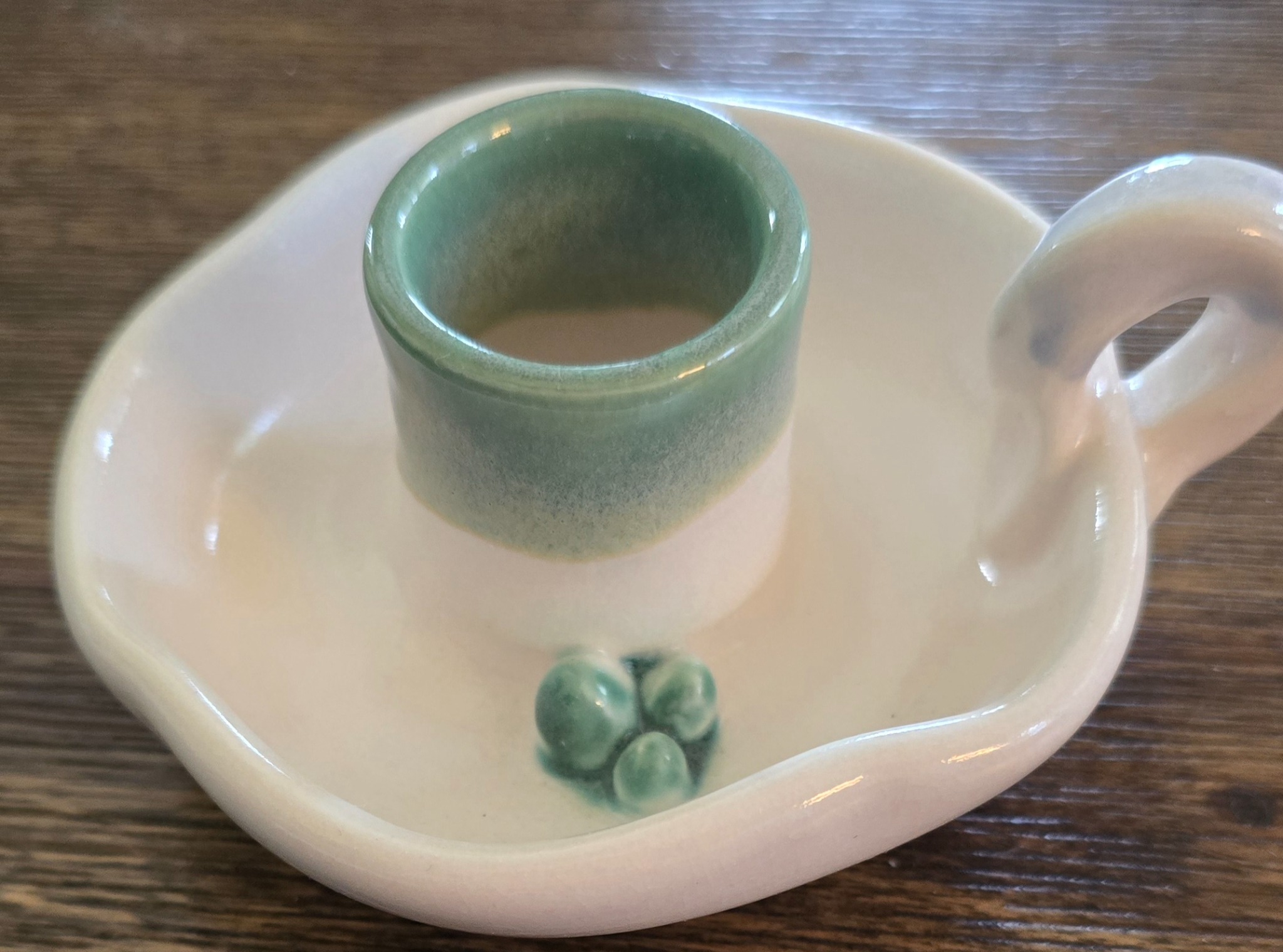 Ceramic candle holder or small decorative dish with attached cup