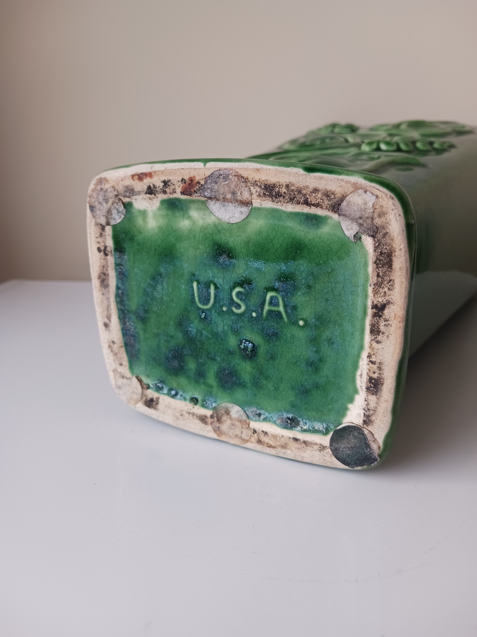 Green glazed ceramic vase or decorative vessel