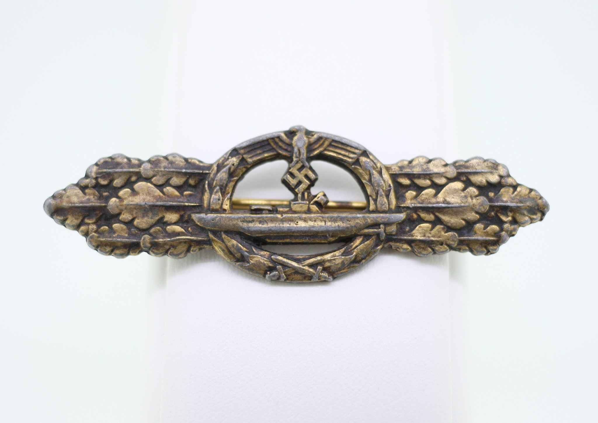 German WWII-style military badge or brooch with swastika motif