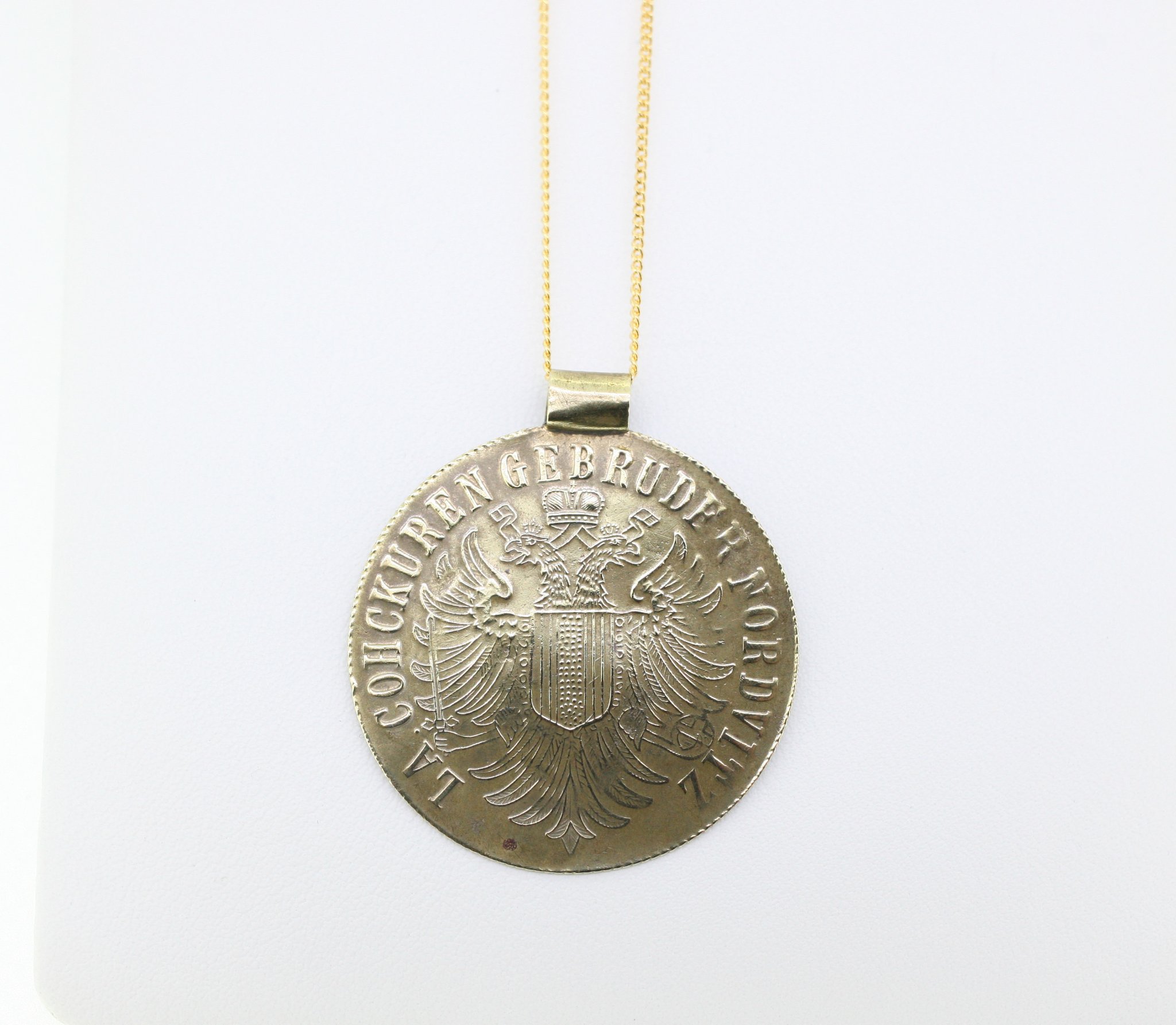 Coin pendant necklace featuring the German Imperial Eagle (Reichsadler) motif