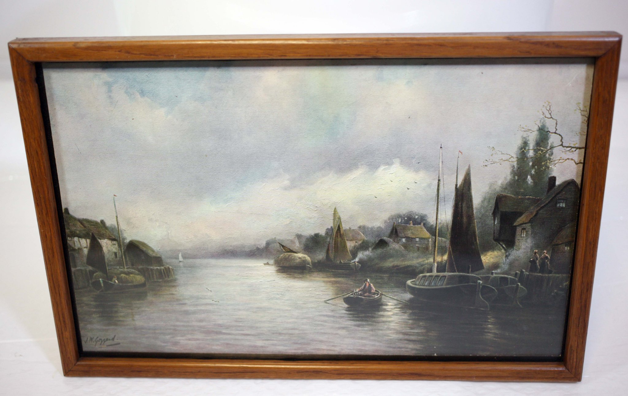 Framed maritime landscape painting (signed lower left, likely a print or original oil)