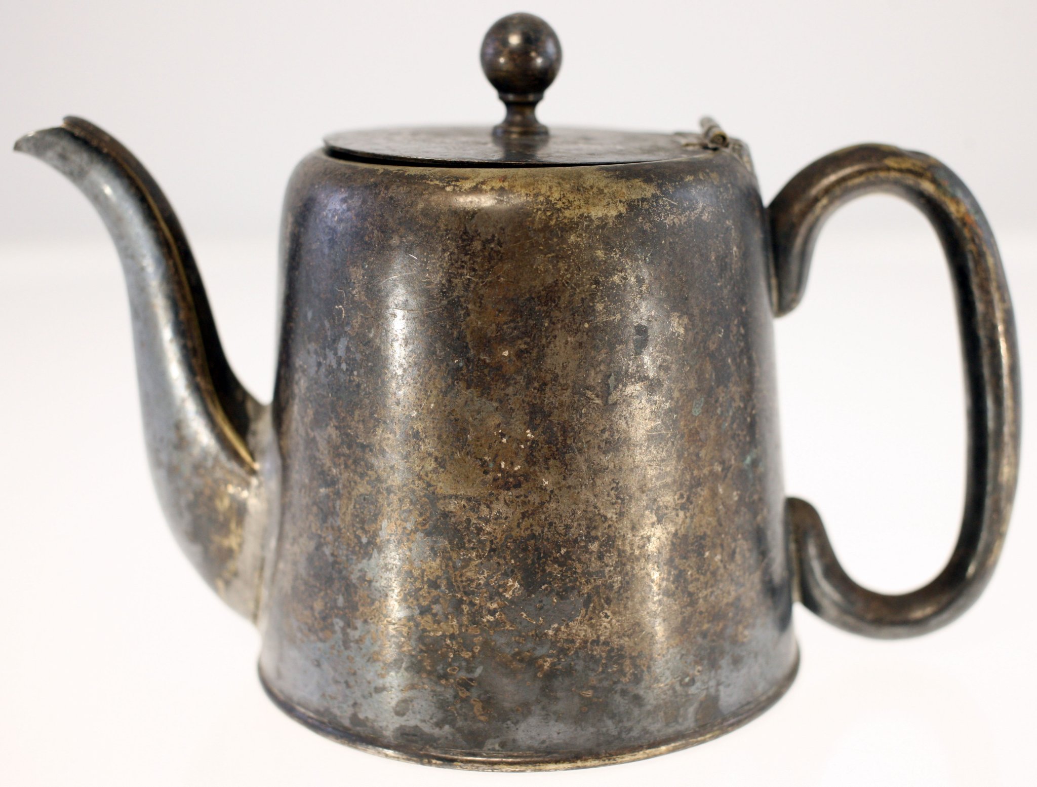 Antique metal teapot or coffee pot