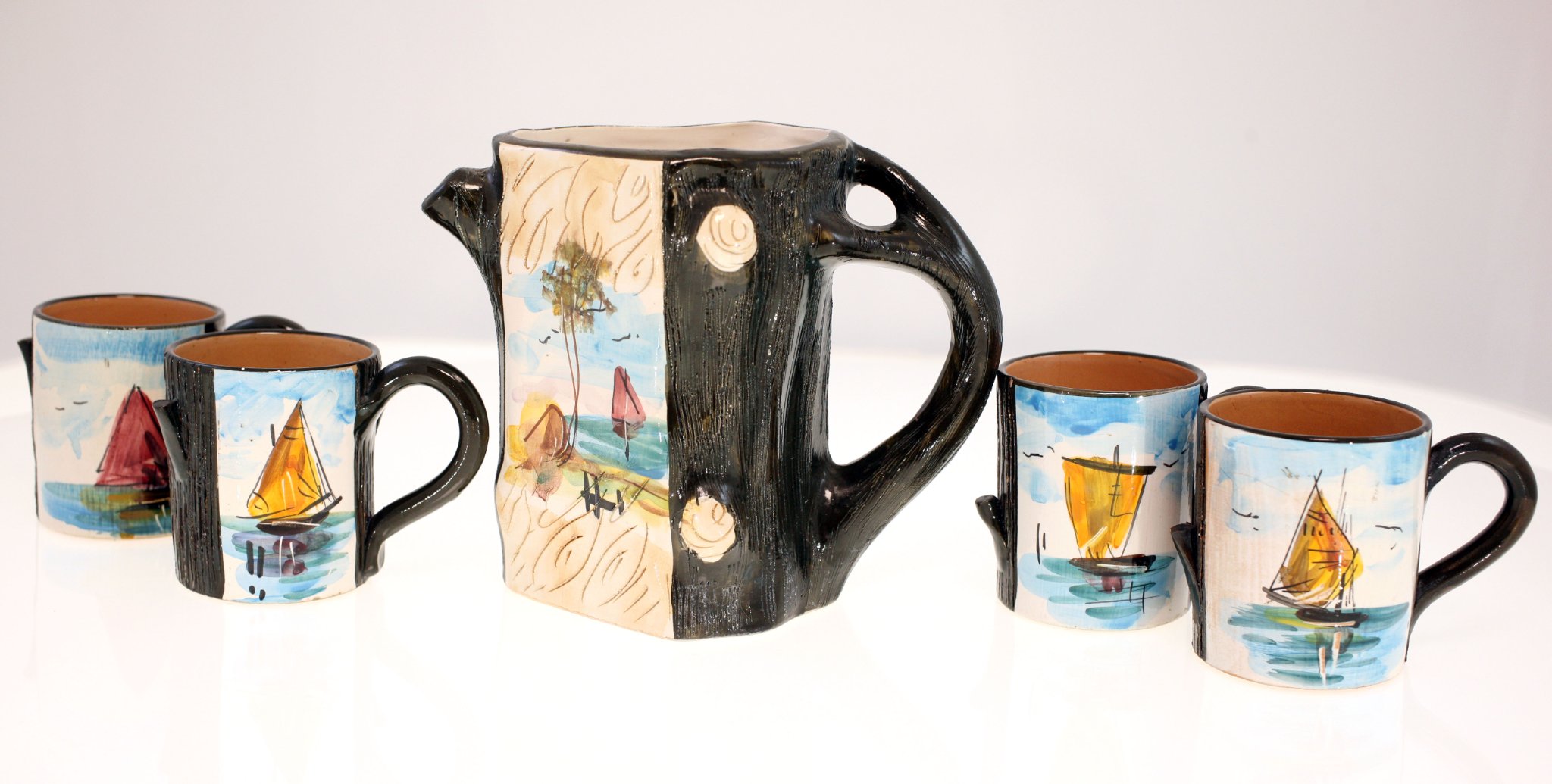Studio pottery ceramic pitcher and matching mugs set