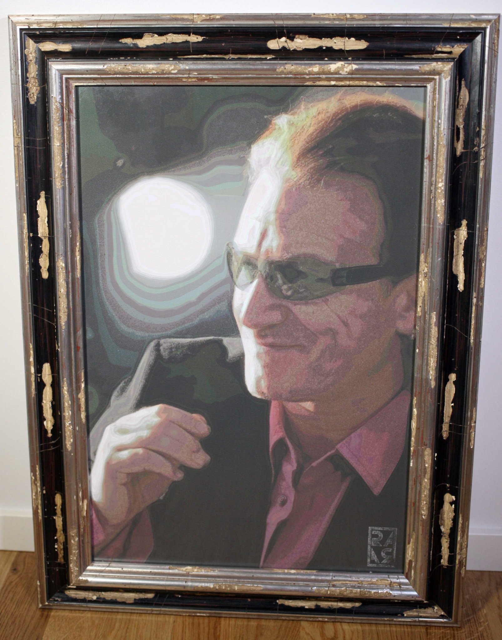 Framed contemporary portrait print or painting of a man in glasses