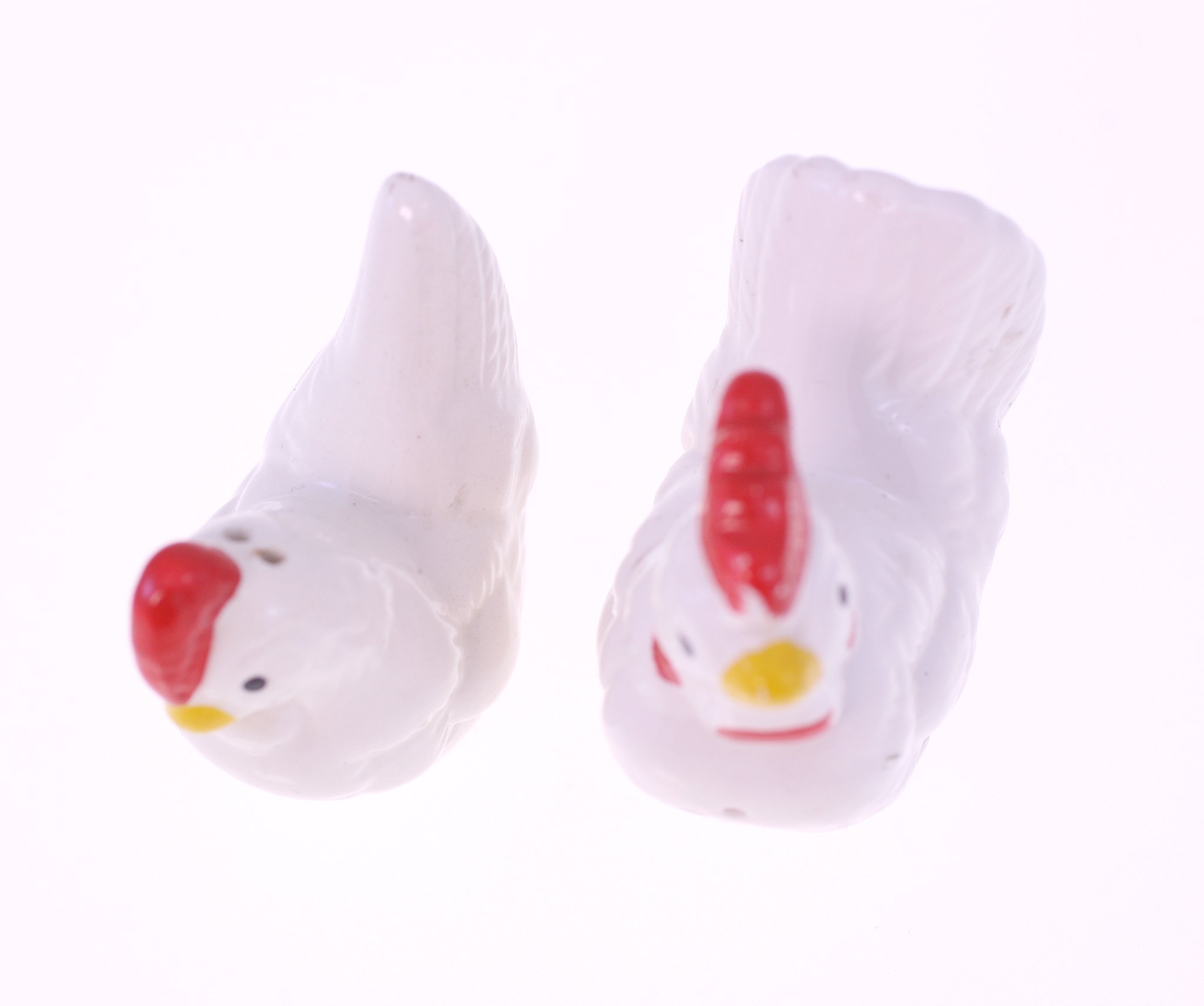 Pair of small glass chicken figurines