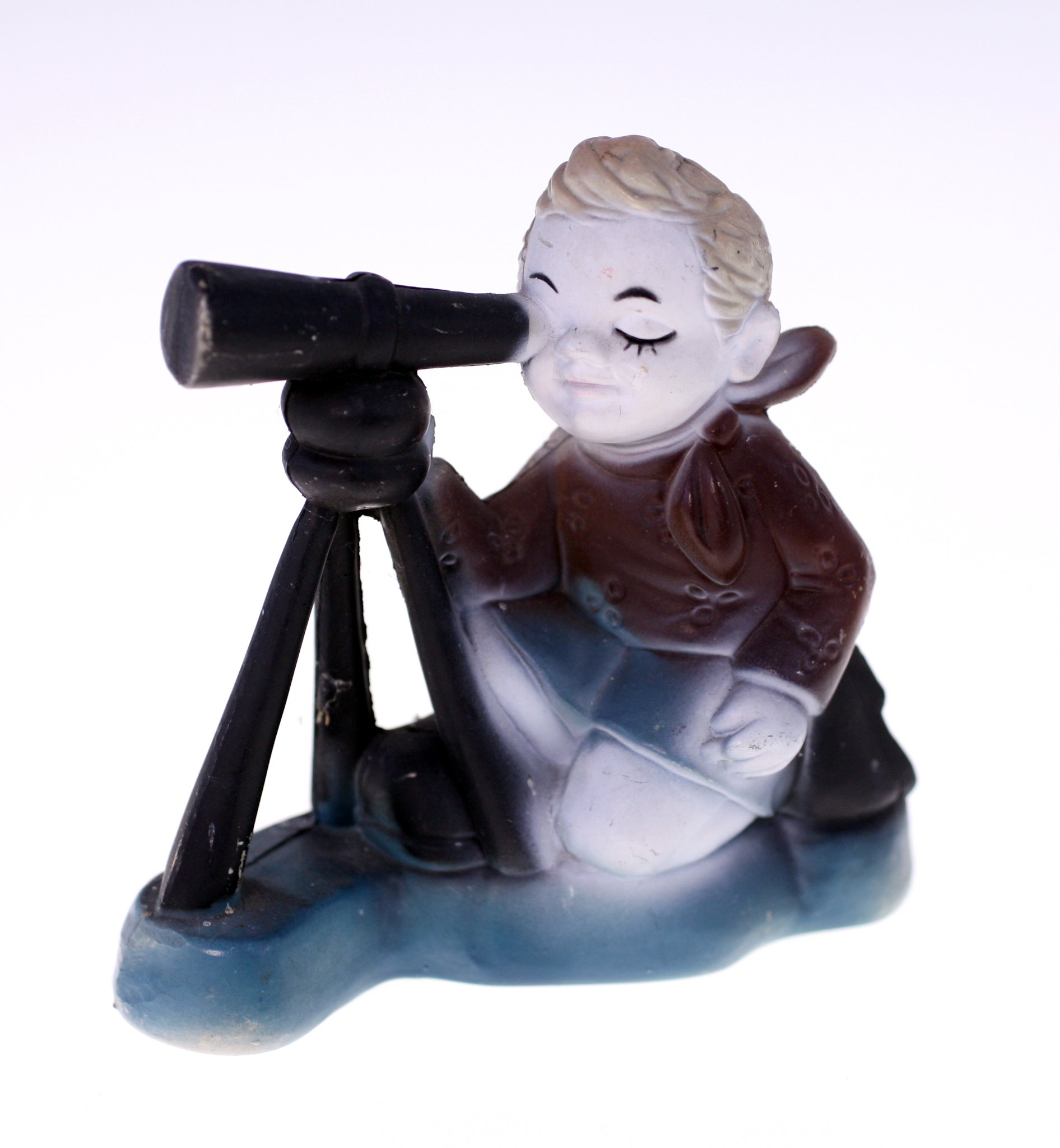 Figural glass perfume bottle or vanity bottle with child and telescope motif