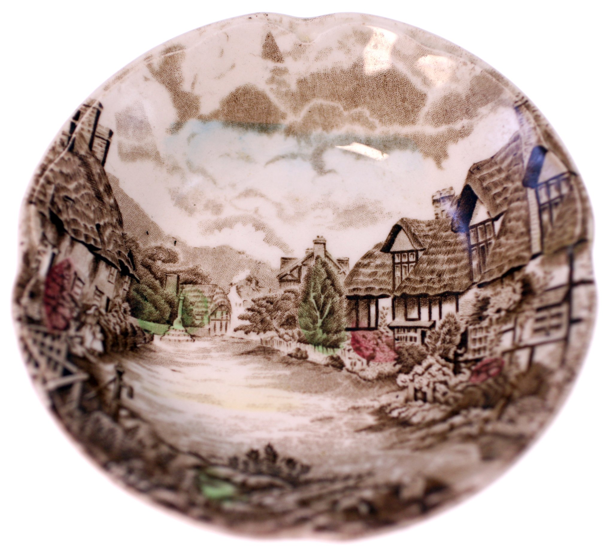 Decorative transferware ceramic plate with rural village scene
