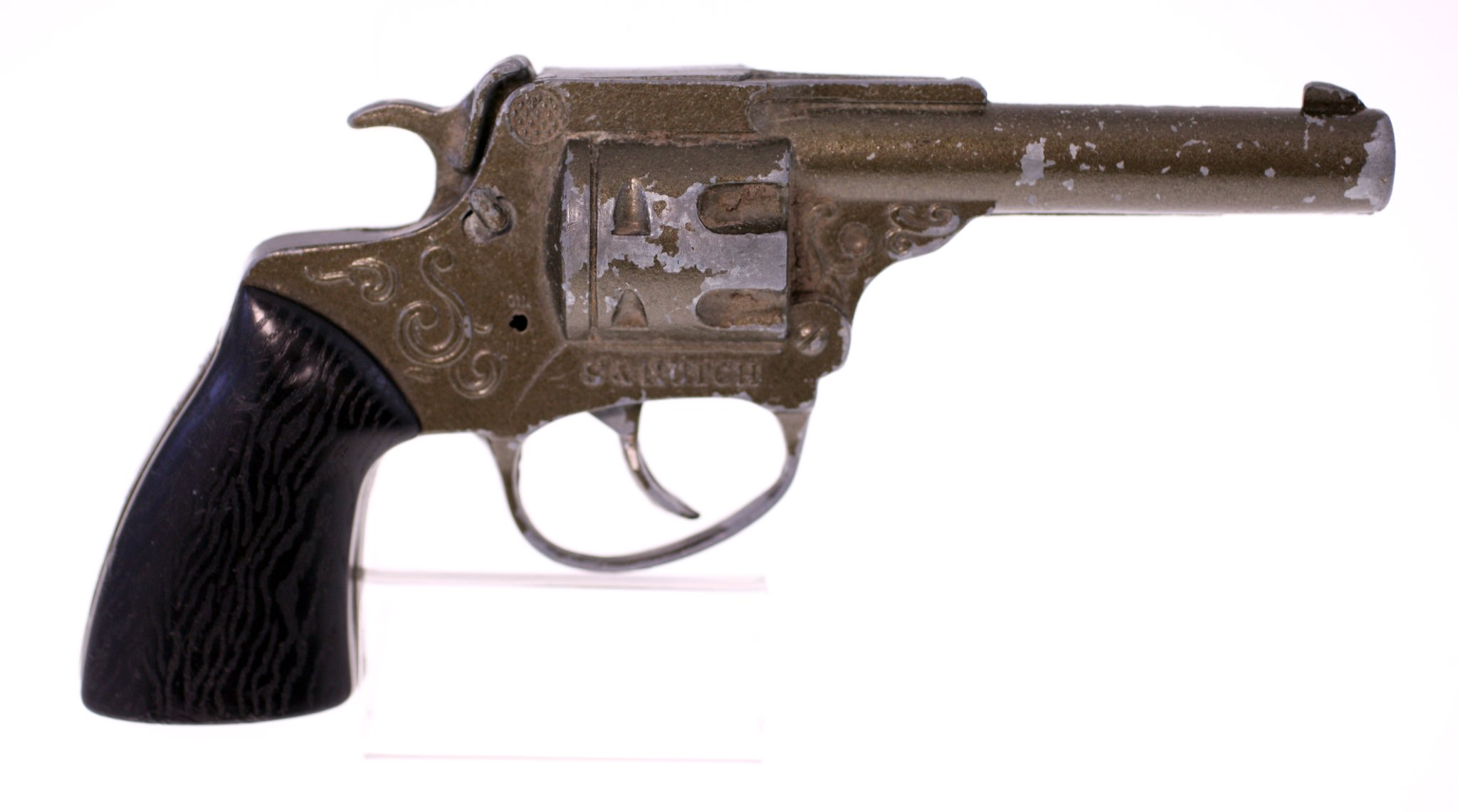 Small antique single-shot or break-action style pistol, likely a toy or novelty cap gun