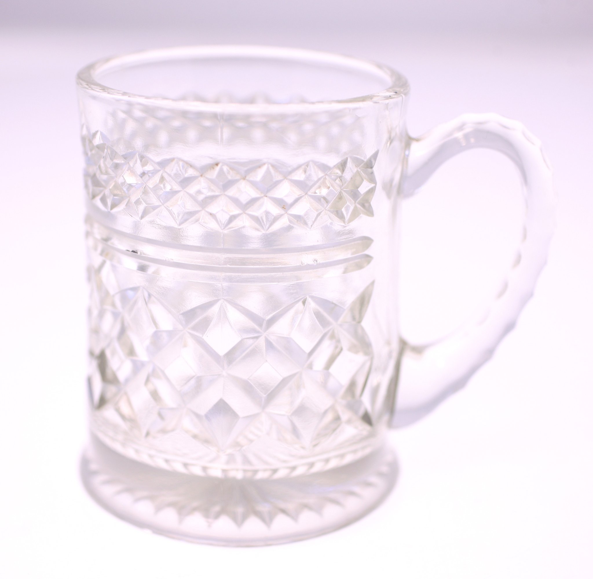 Pressed glass mug / tumbler with handle