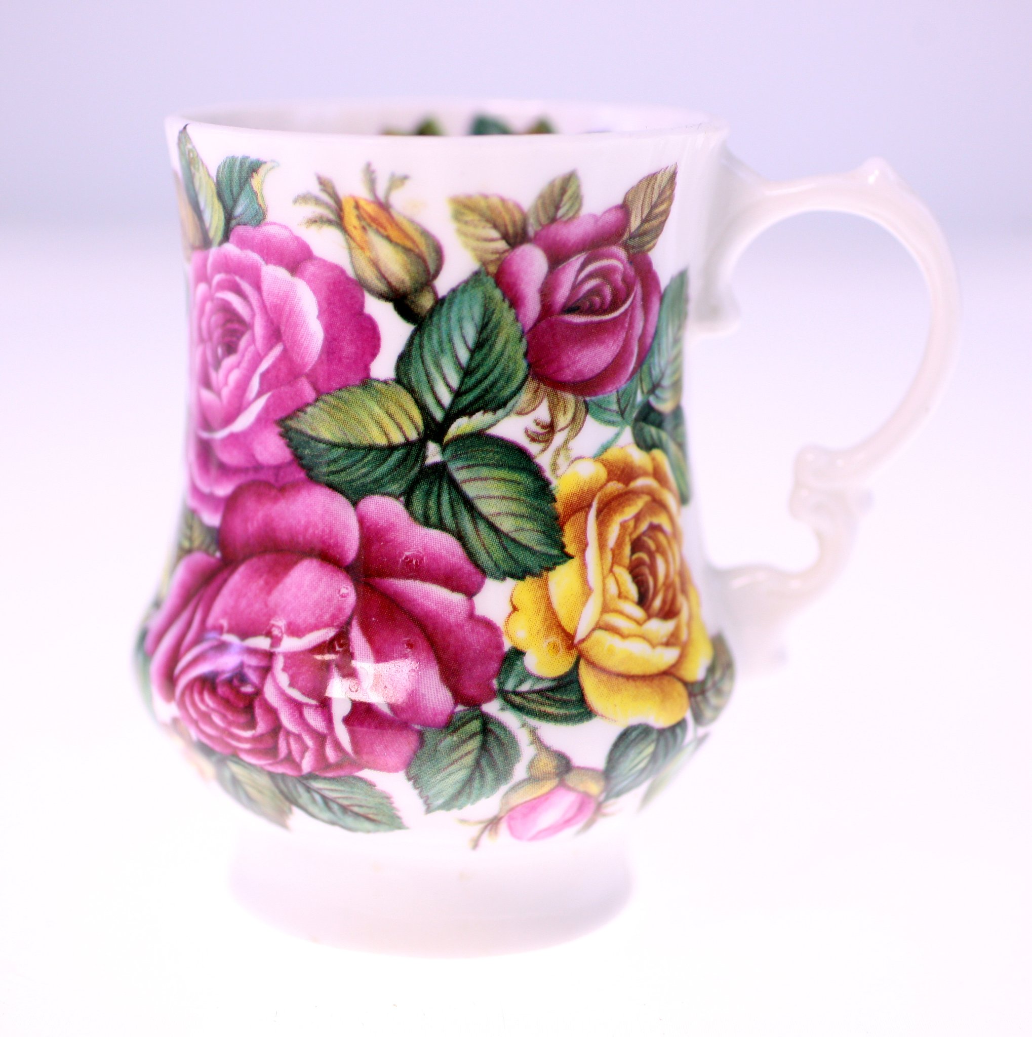 Floral transferware-style ceramic mug or tankard