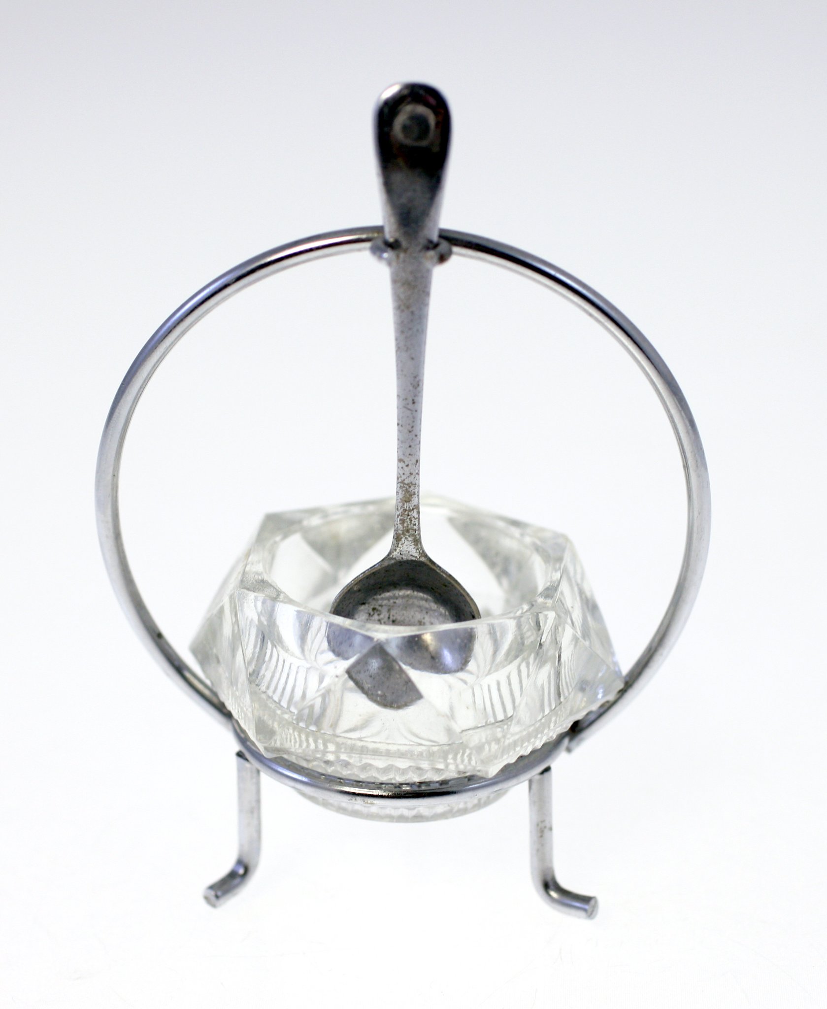 Art Deco-style cocktail stirrer or bar spoon in holder