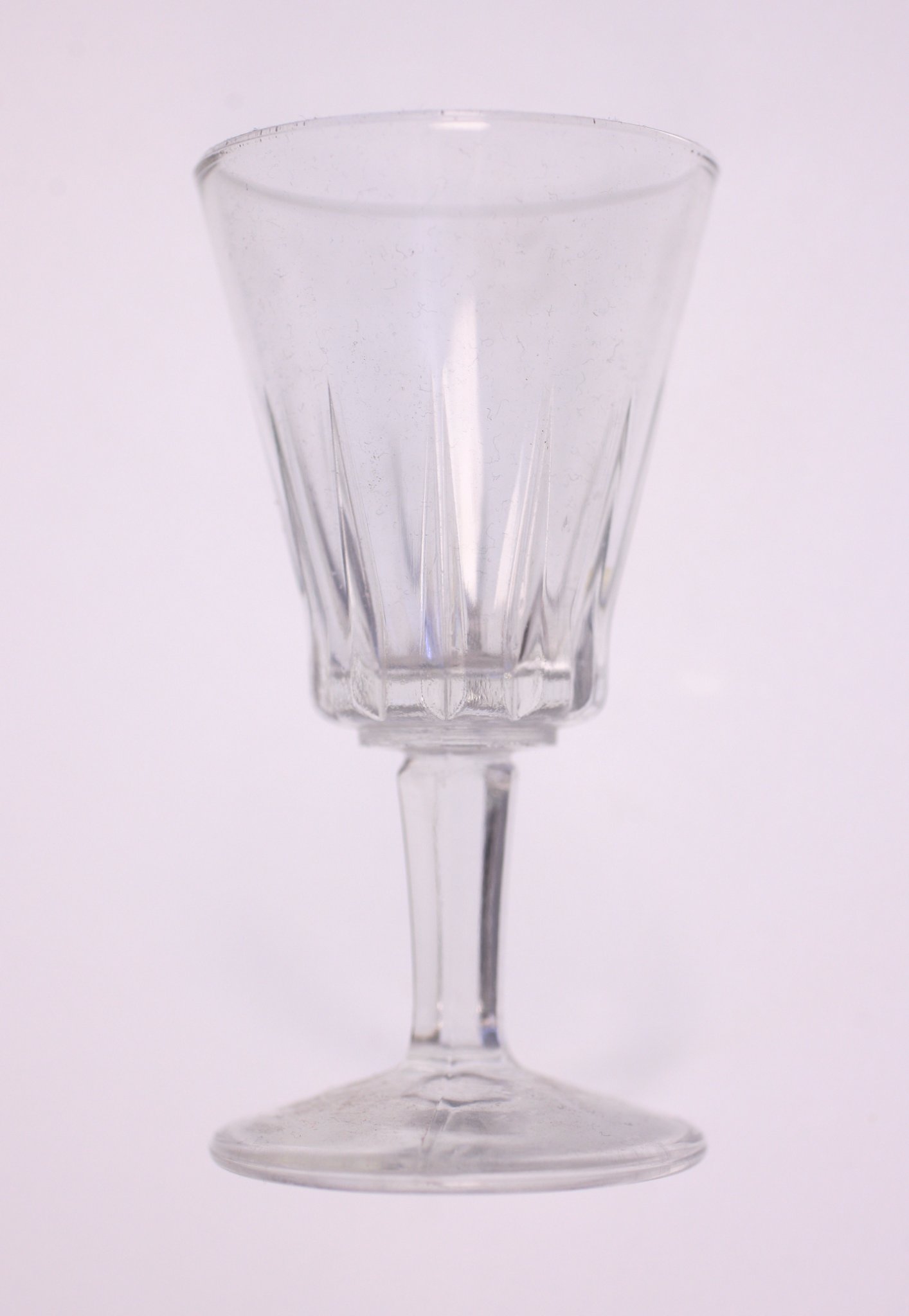 Clear pressed-glass stemmed goblet or wine glass