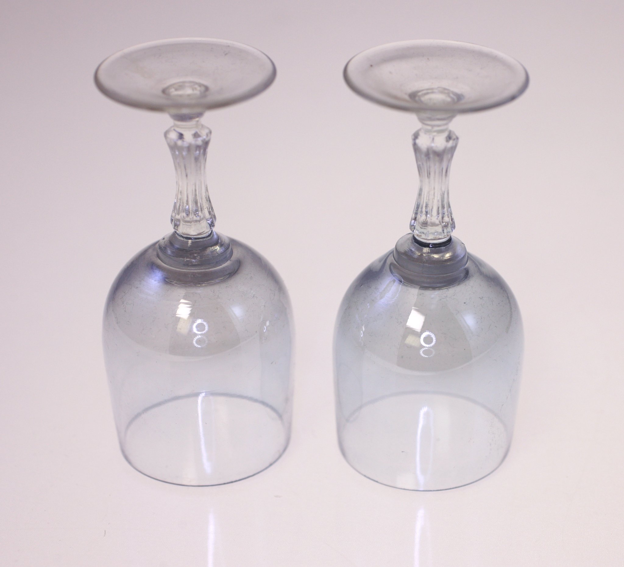 Pair of clear stemmed wine glasses / goblets