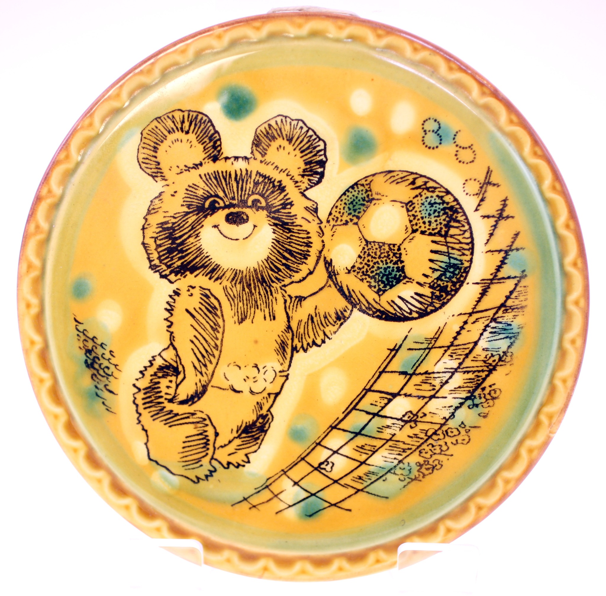 Decorative ceramic plate or trinket dish with teddy bear and ball motif