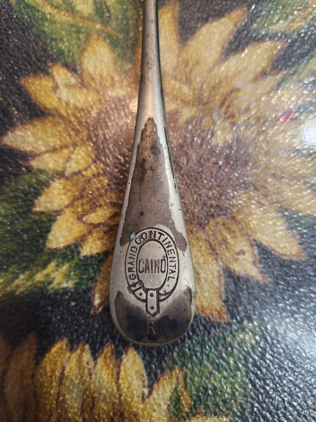 Caimo Grand Continental metal handle or utensil component