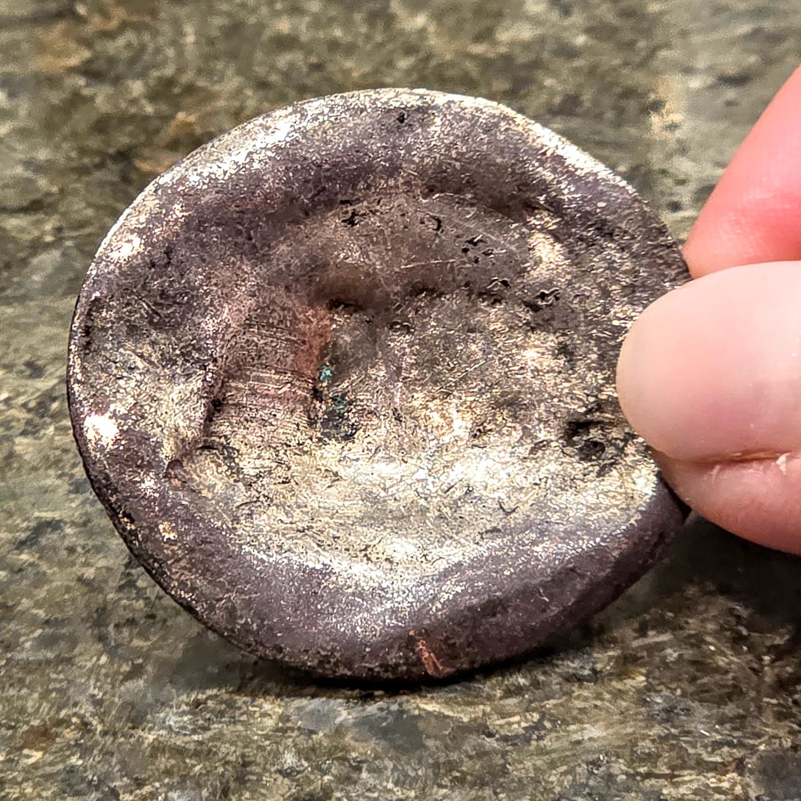 Unknown cast metal disc or button-like object